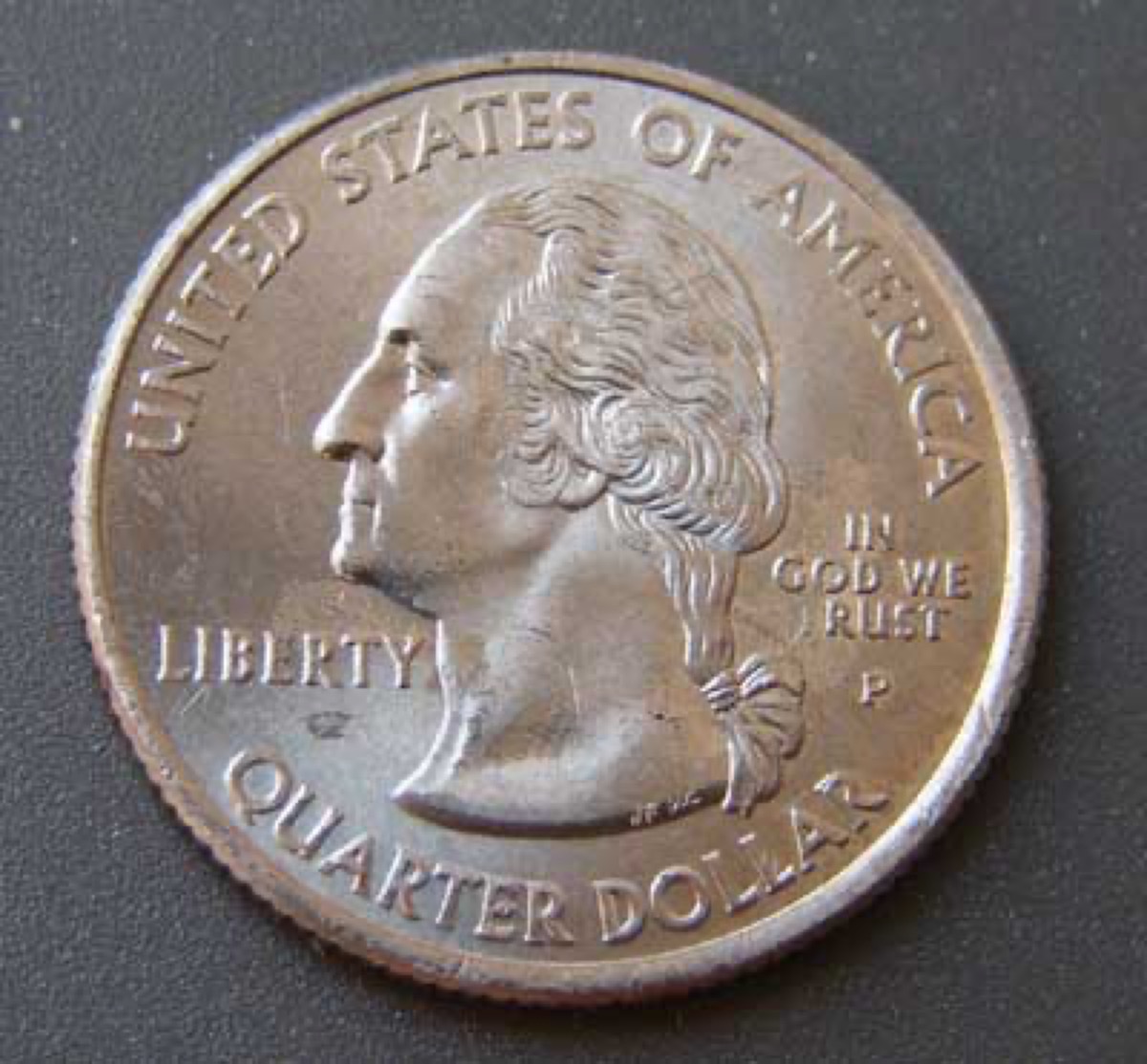 Grease-Filled Die (Struck Through Grease) coin error example