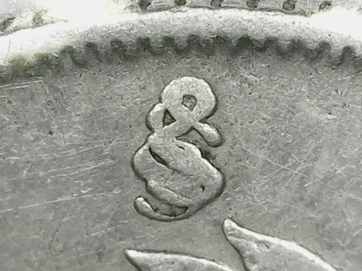 Repunched Mint Mark (RPM) coin error example